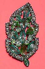 a beautiful vintage costume jewelry Brooch signed Weiss