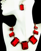 a beautiful vintage costume jewelry necklace, bracelet and earrings