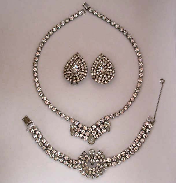 a beautiful vintage costume jewelry necklace, bracelet, earrings