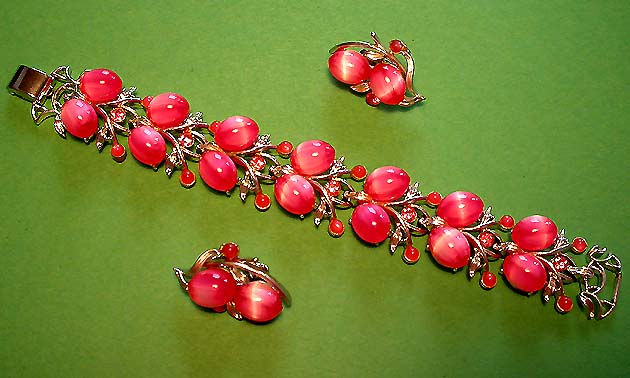 a beautiful vintage costume jewelry fruit salad bracelet and earrings