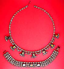 a beautiful vintage costume jewelry necklace, bracelet and clip earrings