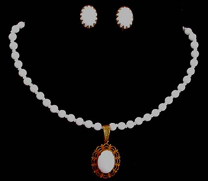 a beautiful vintage costume jewelry Miriam Haskell necklace and earrings