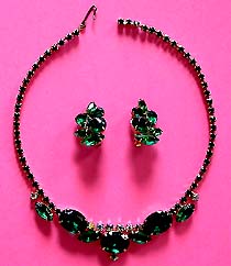 a beautiful vintage costume jewelry necklace, bracelet and earrings