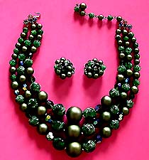 a beautiful Hobe vintage costume jewelry necklace, bracelet and earrings